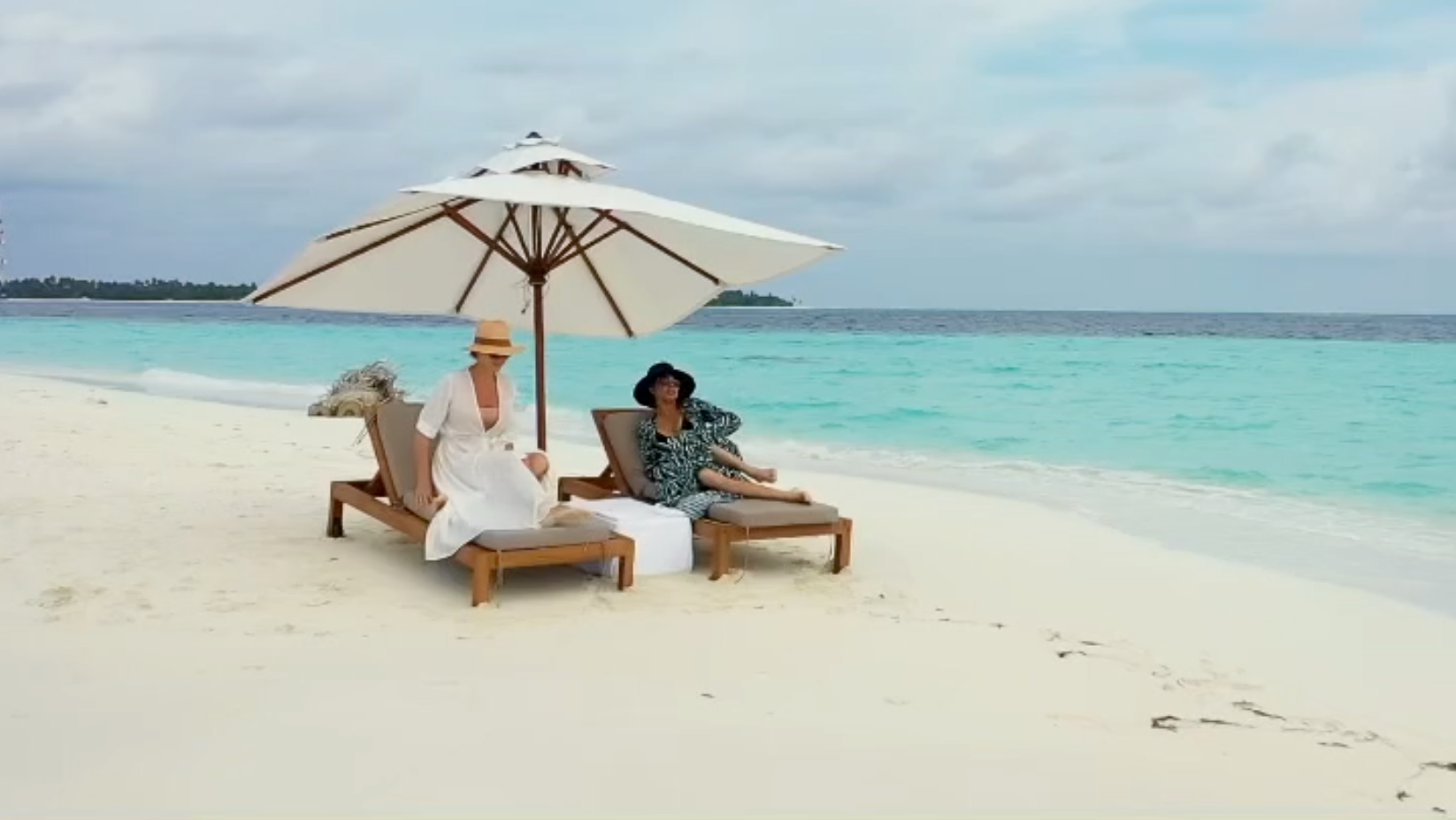 Lilly Becker for Hideaway Beach Resort Maldives - wearing van Dalsky